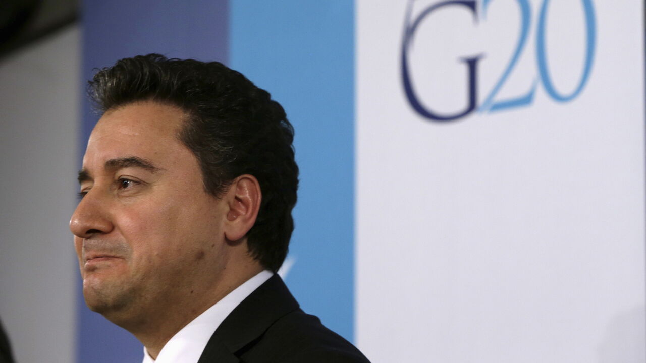 IMF-G20/ Turkey's Deputy Prime Minister for the Economy Ali Babacan answers a question at a news conference during the IMF spring meetings in Washington April 17, 2015. REUTERS/Gary Cameron
- GF10000063295
