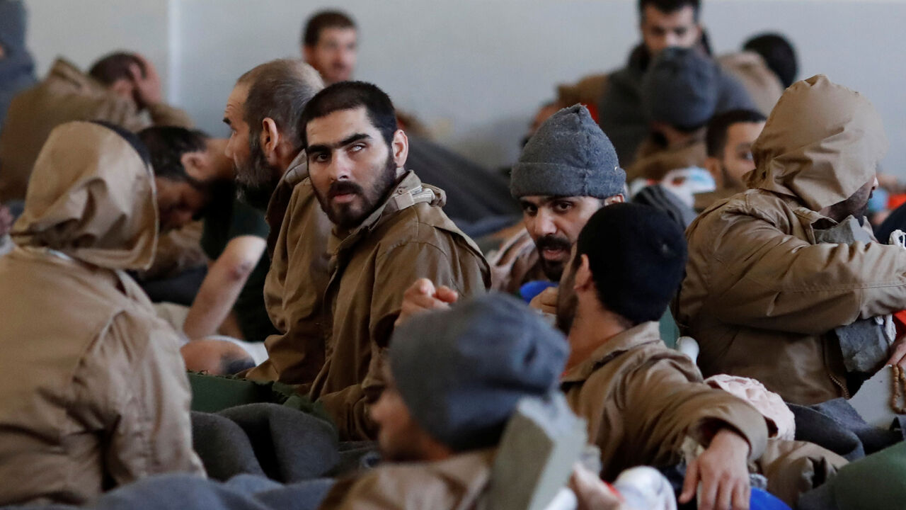 MIDEAST-CRISIS/PRISONERS-ISLAMIC STATE RTS32R2G.jpg