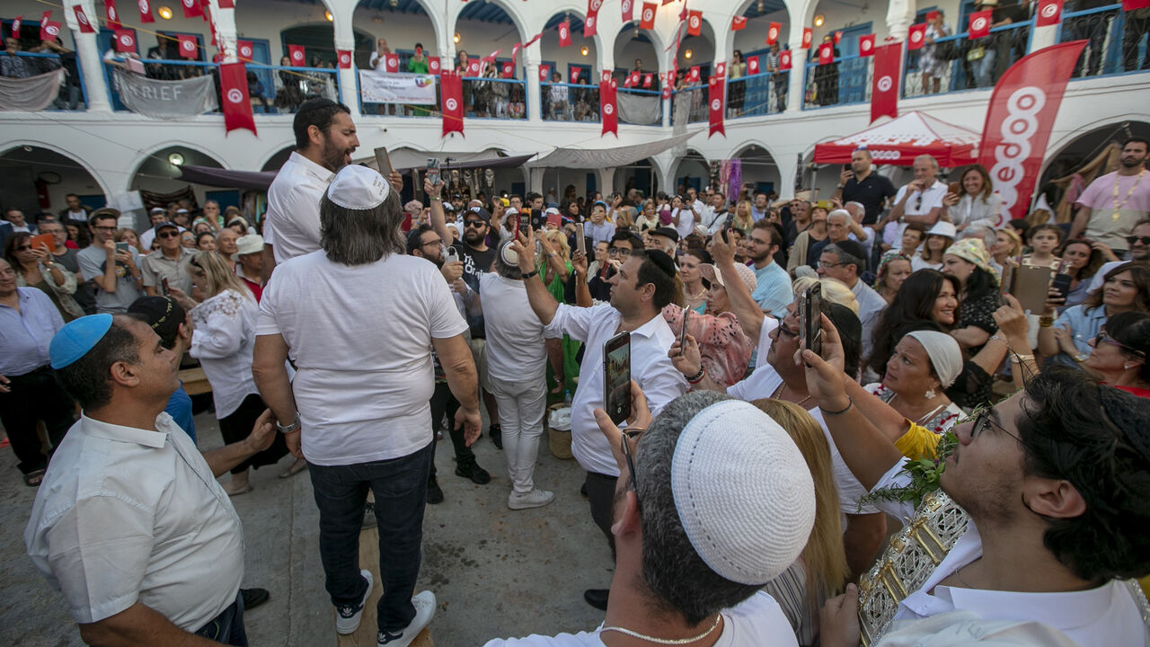 1145774390 DJERBA, TUNISIA - MAY 23: Jewish pilgrims participate in an annual Jewish pilgrimage at the El Ghriba Synagogue, the oldest Jewish monument built in Africa, in Djerba, Tunisia on May 23, 2019. (Photo by Yassine Gaidi/Anadolu Agency/Getty Images)
