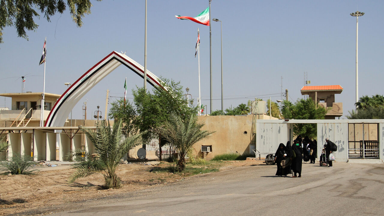 1173093644 A picture taken on October 2, 2019, shows the Khosrawi border crossing between Iraq and Iran, also known as the Munthriya border crossing, in the Diyala province of eastern Iraq, as Iranian pilgrims arrive on their way to the central Iraqi shrine city of Karbala ahead of the Arbaeen religious festival. (Photo by Younis AL-BAYATI / AFP) (Photo by YOUNIS AL-BAYATI/AFP via Getty Images)
