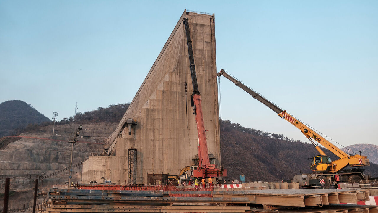 1207684696 (FILES) This file photo taken on December 26, 2019 shows a general view of the construction works at the Grand Ethiopian Renaissance Dam (GERD), near Guba in Ethiopia. - The Nile, Egypt's lifeline since Pharaonic days, faces massive strain from pollution, over-use and climate change -- and now the threat of a colossal dam being built far upstream in Ethiopia. When its London-sized reservoir starts to fill this summer, Egypt fears the mega-project will spell an existential threat to its teeming population of