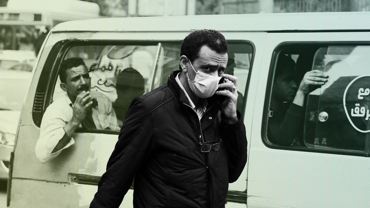 1209777873 CAIRO, EGYPT - APRIL 12: A pedestrian wearing a mask walks on a street in Cairo, Egypt, on April 12, 2020. Egypt's Health Ministry confirmed on Sunday 126 new cases and 13 new deaths of COVID-19, raising the total number of cases registered in the country to 2,065, including 159 deaths. (Photo by Ahmed Gomaa/Xinhua via Getty) (Xinhua/ via Getty Images)