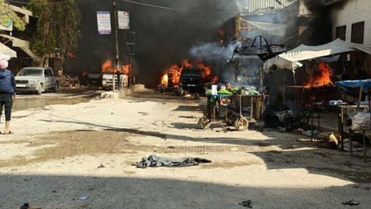 1211164035 AFRIN, SYRIA - MARCH 28: (----EDITORIAL USE ONLY √¢ MANDATORY CREDIT - " TURKISH NATIONAL DEFENSE MINISTRY / HANDOUT" - NO MARKETING NO ADVERTISING CAMPAIGNS - DISTRIBUTED AS A SERVICE TO CLIENTS----) A footage captured from a video shows burning vehicles and shops after an attack carried out by PKK, listed as a terrorist organization by Turkey, the U.S. and the EU, and Syrian Kurdish YPG militia, which Turkey regards as a terror group, in Afrin, Syria on April 28, 2020. Civilian death toll in YPG/PKK attac