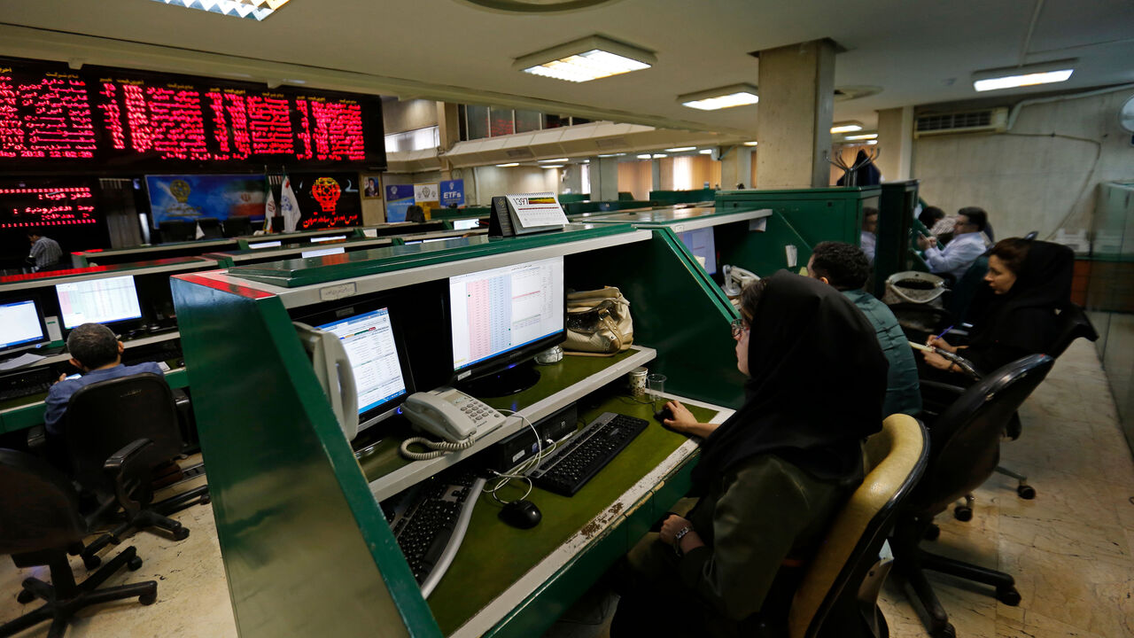 955930592 Iranian dealers monitor the stock market at the stock exchange in the capital Tehran on May 8, 2018. - Renewed nuclear sanctions would certainly cause severe problems for Iran's economy, but much of the damage has already been done by the uncertainty created by the US and myriad home-grown problems. (Photo by ATTA KENARE / AFP) (Photo credit should read ATTA KENARE/AFP via Getty Images)