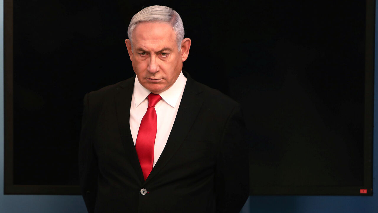 Israeli Prime Minister Benjamin Netanyahu arrives for a speech at his Jerusalem office, regarding the new measures that will be taken to fight the coronavirus, March 14, 2020. Gali Tibbon/Pool via REUTERS - RC2WJF9BHL7Z