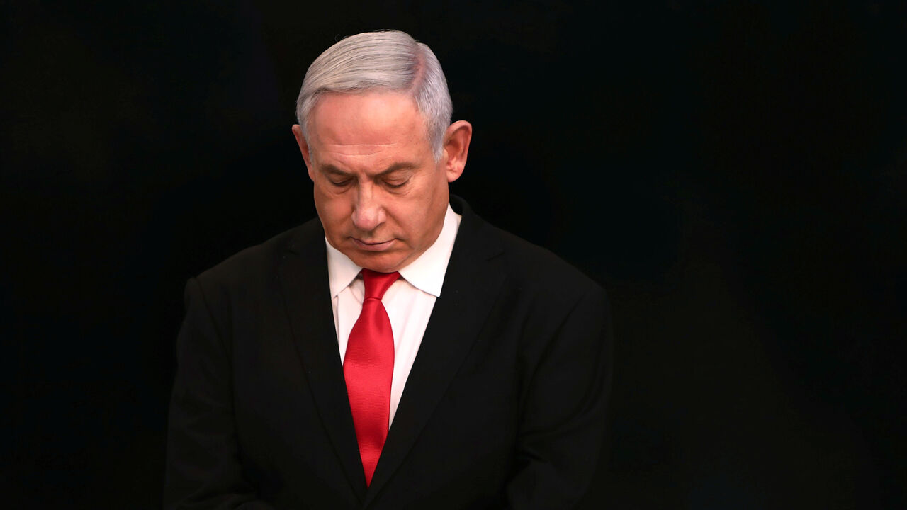 HEALTH-CORONAVIRUS/ISRAEL Israeli Prime Minister Benjamin Netanyahu arrives for a speech at his Jerusalem office, regarding the new measures that will be taken to fight the coronavirus, March 14, 2020. Gali Tibbon/Pool via REUTERS - RC2WJF9D9S2R