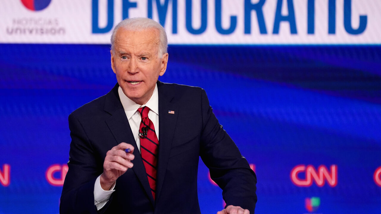 USA-ELECTION/DEBATE Democratic U.S. presidential candidate and former Vice President Joe Biden speaks during the 11th Democratic candidates debate of the 2020 U.S. presidential campaign, held in CNN's Washington studios without an audience because of the global coronavirus pandemic, in Washington, U.S., March 15, 2020. REUTERS/Kevin Lamarque - HP1EG3G058XET