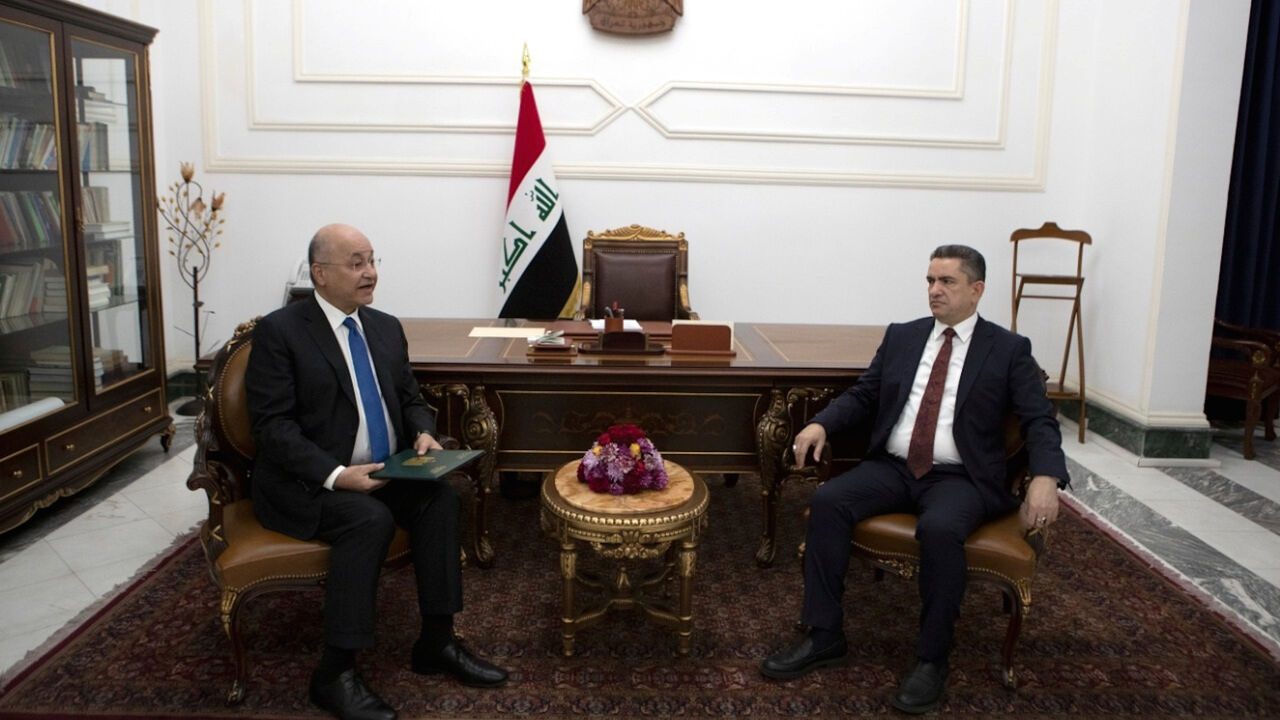IRAQ-POLITICS/ Iraq's President Barham Salih meets with new prime minister-designate Adnan al-Zurfi in Baghdad, Iraq March 17, 2020. The Presidency of the Republic of Iraq Office/Handout via REUTERS ATTENTION EDITORS - THIS IMAGE WAS PROVIDED BY A THIRD PARTY. - RC2NLF98KLH9