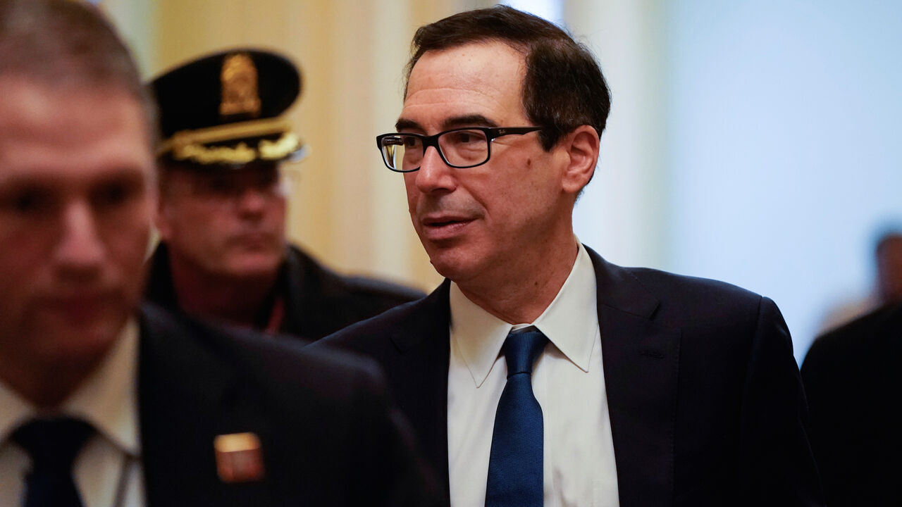 HEALTH-CORONAVIRUS/USA-CONGRESS U.S. Secretary of the Treasury Steven Mnuchin walks from a meeting during negotiations on a coronavirus disease (COVID-19) relief package on Capitol in Washington, U.S., March 23, 2020. REUTERS/Joshua Roberts - RC2QPF9GZ5DS