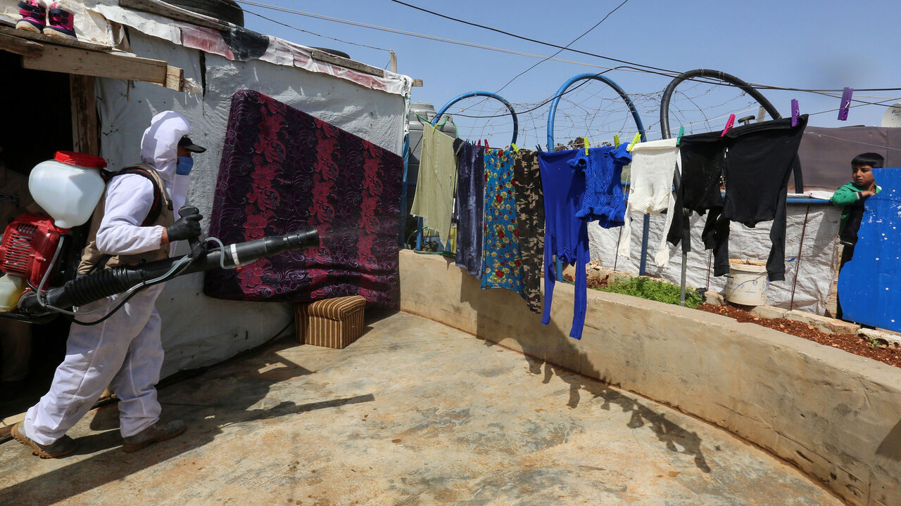 HEALTH-CORONAVIRUS/SYRIAN REFUGEES RTS37BZ2.jpg