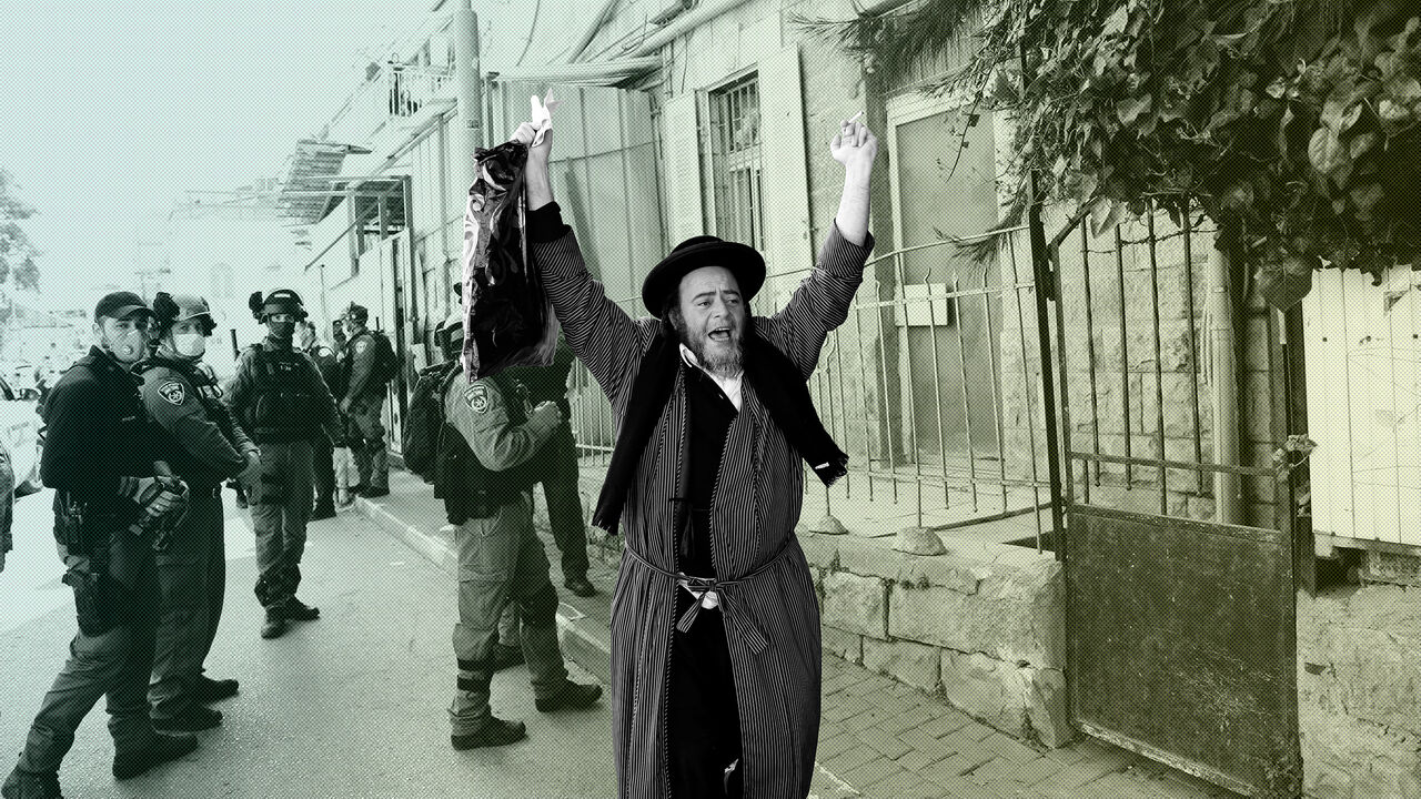 HEALTH-CORONAVIRUS/ISRAEL-ULTRAORTHODOX An ultra-Orthodox Jewish man reacts after police fined him for defying government restrictions set in place to curb the spread of the coronavirus disease (COVID-19), in Mea Shearim neighborhood of Jerusalem April 6, 2020. REUTERS/Ronen Zvulun - RC2YYF9YPX0X