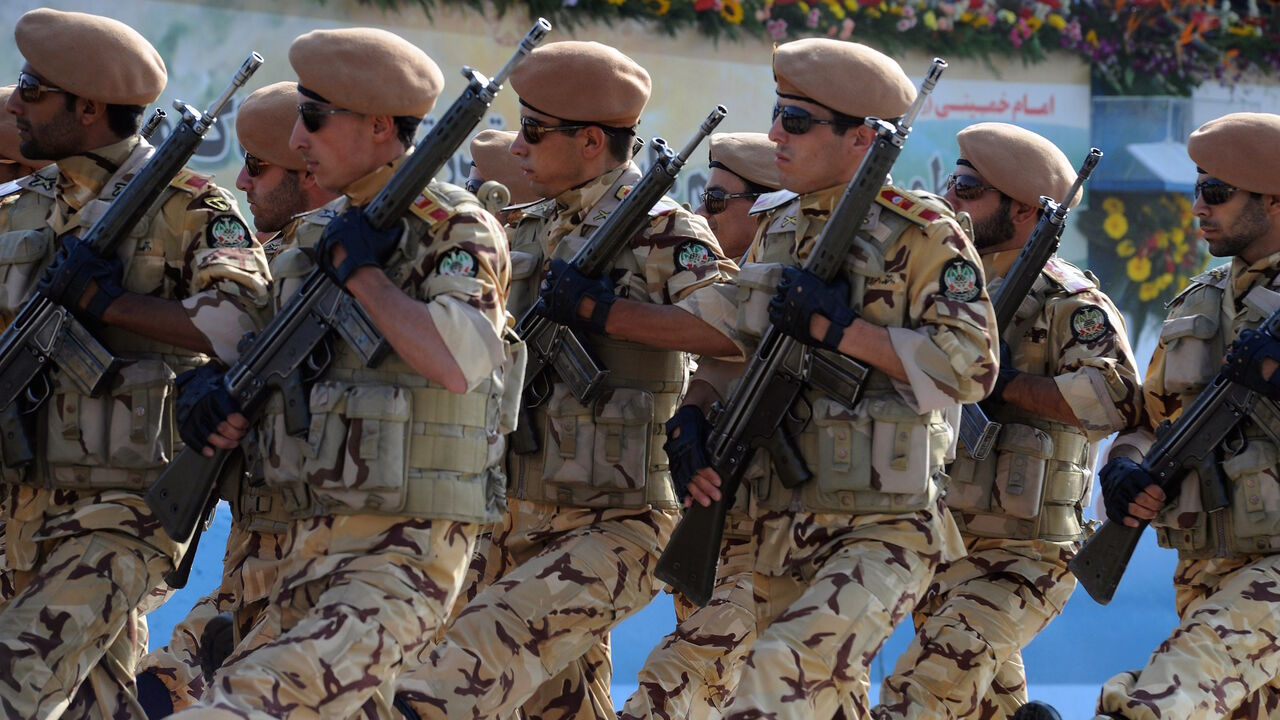 126669816 TEHRAN, IRAN - SEPTEMBER 22: Iranian armed forces march during a parade commemorating the 31st anniversary of Iran-Iraq war on September 22, 2011 in Tehran, Iran. Iran is holding military parades in Tehran and other parts of the country on the first day of the Sacred Defence Week. Tehran's parade began to the north of Imam Khomeini's mausoleum providing the army, Islamic Revolution Guards Corps, Law Enforcement Force and Basij with an opportunity to display their state of military preparedness, in which ar