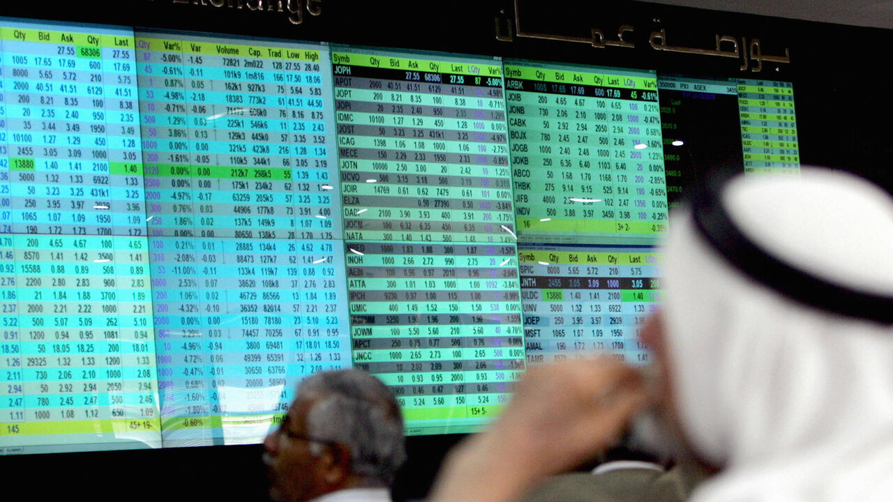 83367792 Jordanian traders follow the market's movements at the Amman Stock Exchange on October 21, 2008. Jordan's King Abdullah II announced earlier this month a series of economic measures for his cash-strapped desert kingdom, where inflation and unemployment are both hovering around 15 percent. AFP PHOTO/KHALIL MAZRAAWI (Photo credit should read KHALIL MAZRAAWI/AFP via Getty Images)