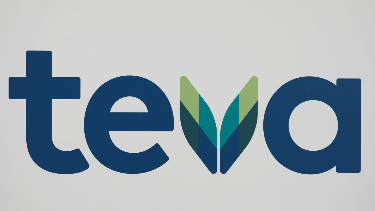The logo of Teva Pharmaceutical Industries is seen during a news conference hold by its CEO, Kare Schultz, to discuss the company's 2019 outlooks in Tel Aviv, Israel February 19, 2019. REUTERS/Amir Cohen - RC16F0E05360