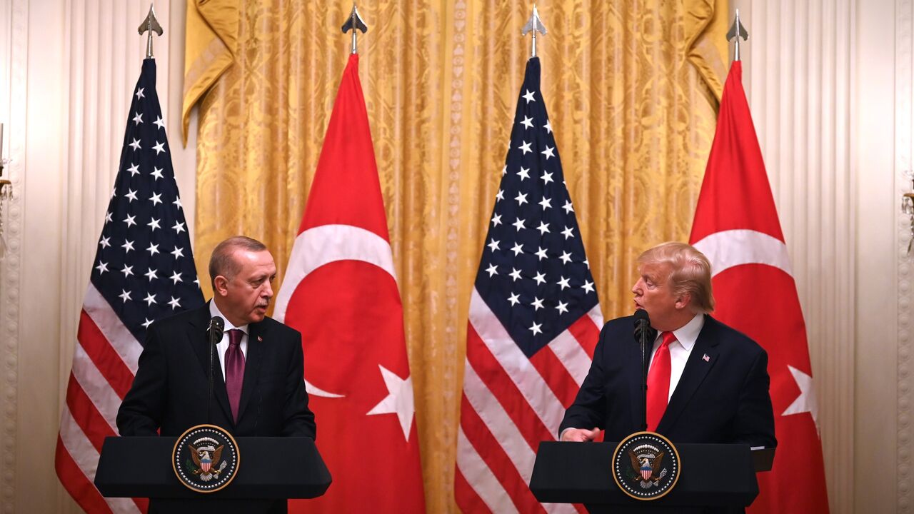 1182175804 US President Donald Trump and Turkey's President Recep Tayyip Erdogan (L) take part in a joint press conference in the East Room of the White House in Washington, DC on November 13, 2019. - President Donald Trump greeted his Turkish counterpart Recep Tayyip Erdogan at the White House for a high-stakes meeting Wednesday that underlined his claim to be ignoring the impeachment drama unfolding simultaneously in Congress. (Photo by JIM WATSON / AFP) (Photo by JIM WATSON/AFP via Getty Images)