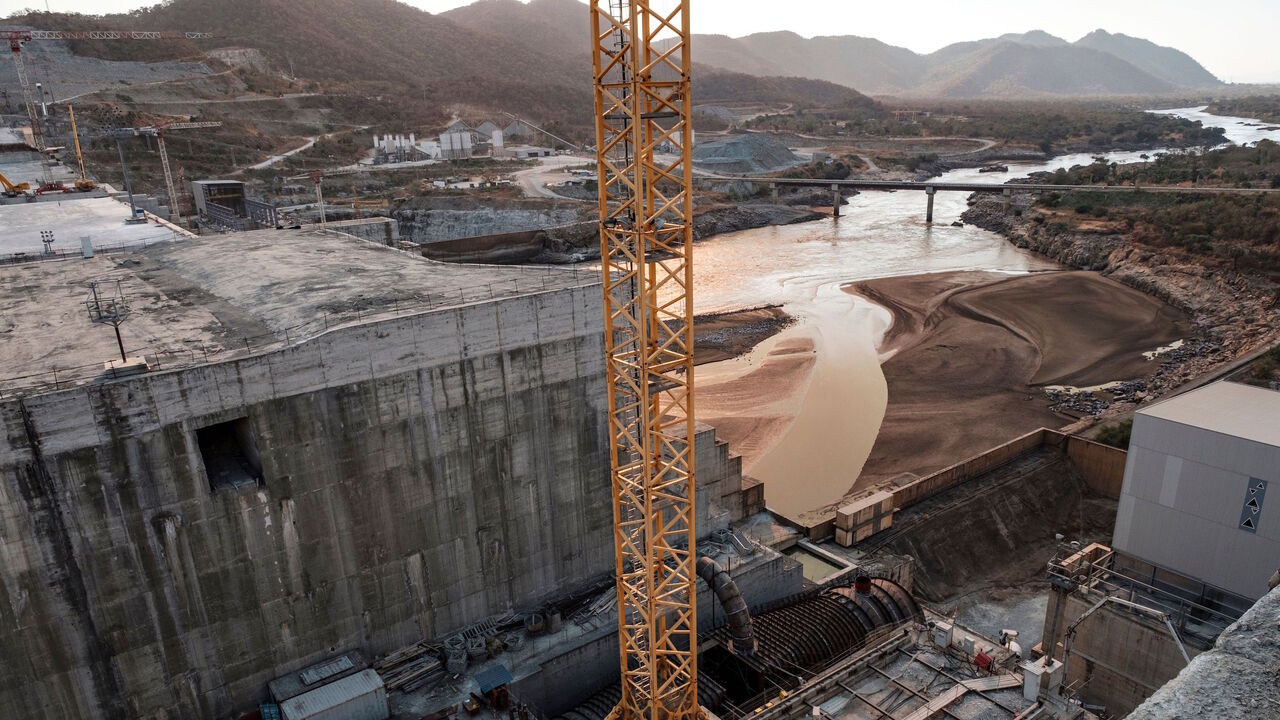 1207684703 (FILES) This file photo taken on December 26, 2019 shows a general view of the Blue Nile river as it passes through the Grand Ethiopian Renaissance Dam (GERD), near Guba in Ethiopia. - The Nile, Egypt's lifeline since Pharaonic days, faces massive strain from pollution, over-use and climate change -- and now the threat of a colossal dam being built far upstream in Ethiopia. When its London-sized reservoir starts to fill this summer, Egypt fears the mega-project will spell an existential threat to its teemin