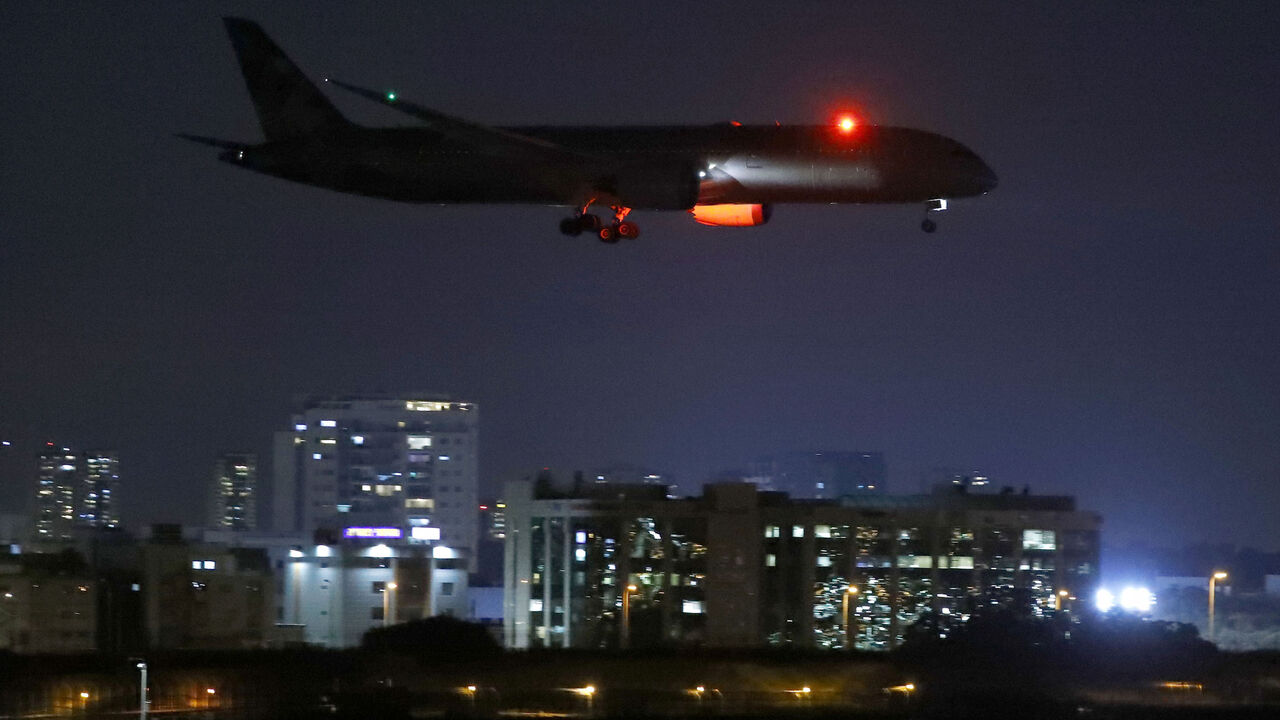 1218941185 A cargo plane operated by Etihad Airways, carrying medical aid for Palestinians related to the coronavirus Covid-19 disease, prepares to land at Israel's Ben Gurion Airport near Tel Aviv on June 9, 2020. - The United Arab Emirates flew its first publicly announced flight to Israel on May 20, 2020 when Etihad Airways sent medical supplies to help the Palestinians cope with the coronavirus pandemic. Except for Jordan and Egypt, Arab countries have no official relations with Israel but Gulf Arab nations like t