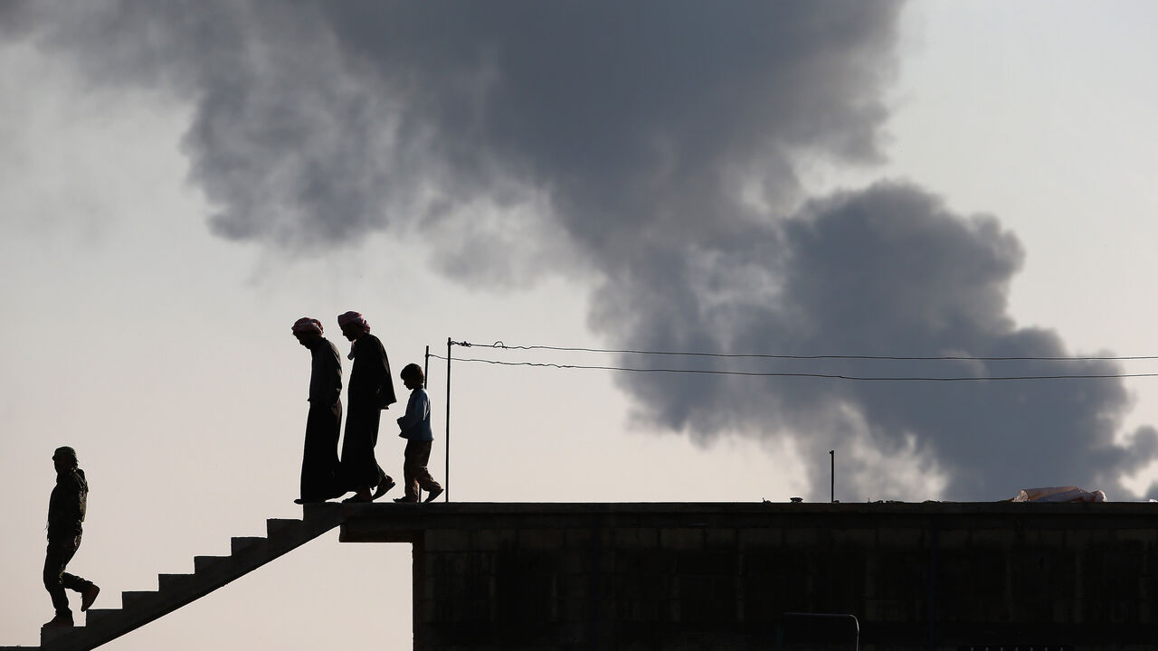 496532886 HOLE, SYRIA - NOVEMBER 09: November 9, 2015 in Hassica, Rojava, Syria. (Photo by John Moore/Getty Images)
