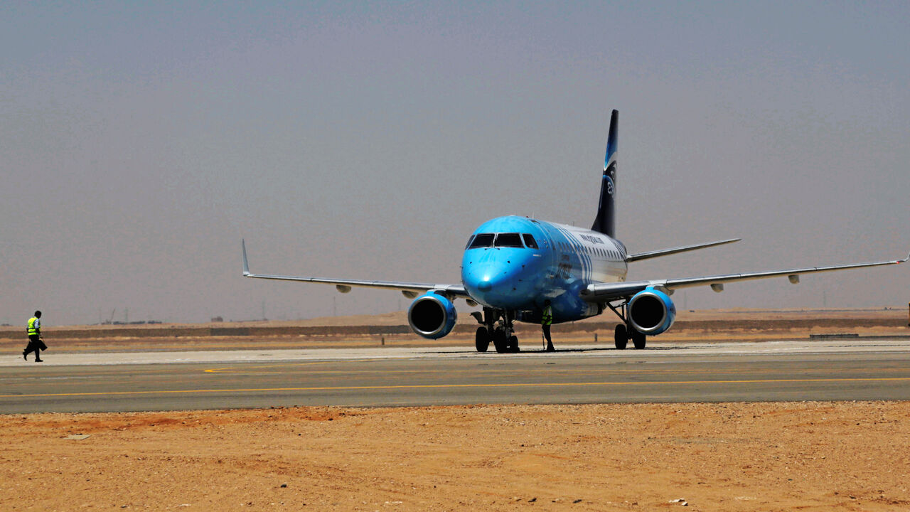 An EgyptAir plane lands on the runway of the Capital International Airport, a new airport built for Egypt's new capital, known as the New Administrative Capital (NAC), east of Cairo, Egypt July 9, 2019. Picture taken July 9, 2019. REUTERS/Hayam Adel - RC15C51DE710