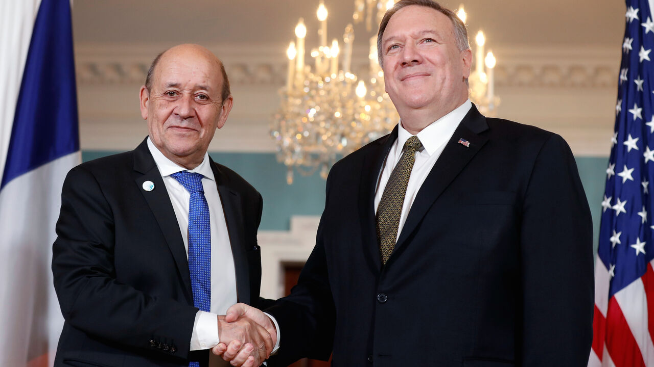 U.S. Secretary of State Mike Pompeo and French Foreign Minister Jean-Yves Le Drian pose for a photo at the State Department in Washington, U.S., November 14, 2019. REUTERS/Yara Nardi - RC27BD95PIEM