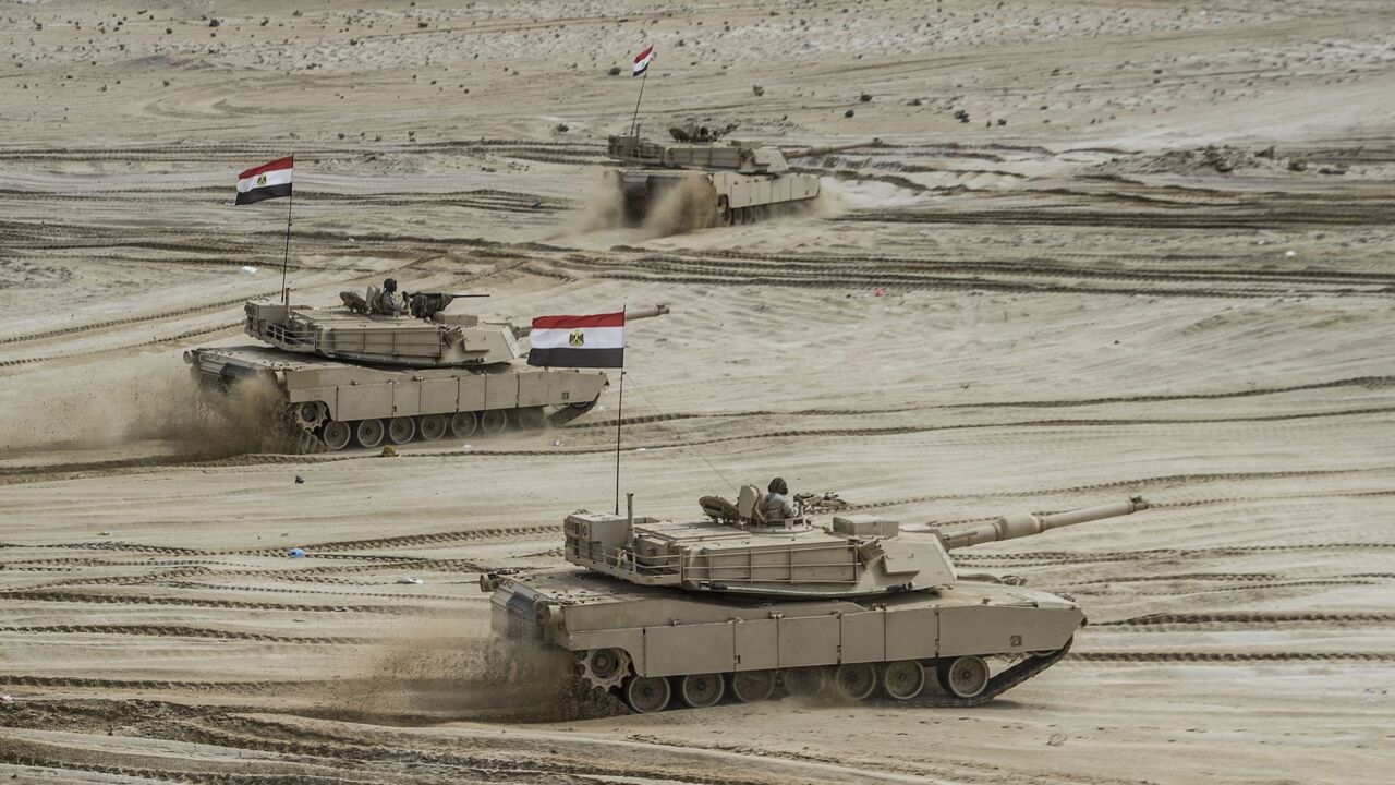 1061843456 Egyptian tanks take part in the Arab Shield joint military exercises at Mohamed Naguib military base in El-Hamam near the Mediterranean coast, about 240 kilometres northwest of the capital Cairo on November 15, 2018. - Forces from Saudi Arabia, Egypt, the UAE, Kuwait, Bahrain and Jordan are taking part in the maneuvers. (Photo by Khaled DESOUKI / AFP) (Photo credit should read KHALED DESOUKI/AFP via Getty Images)