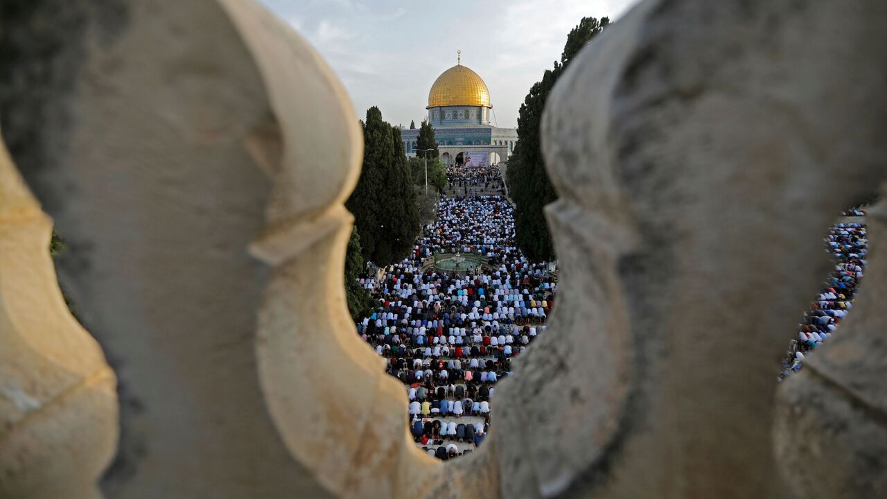 1148084207 Palestinian Muslims perform the morning Eid al-Fitr prayer at the Al-Aqsa Mosque compound, Islam's third most holy site, in the Old City of Jerusalem on June 5, 2019. - Muslims worldwide celebrate Eid al-Fitr marking the end of the fasting month of Ramadan. (Photo by AHMAD GHARABLI / AFP) (Photo credit should read AHMAD GHARABLI/AFP via Getty Images)