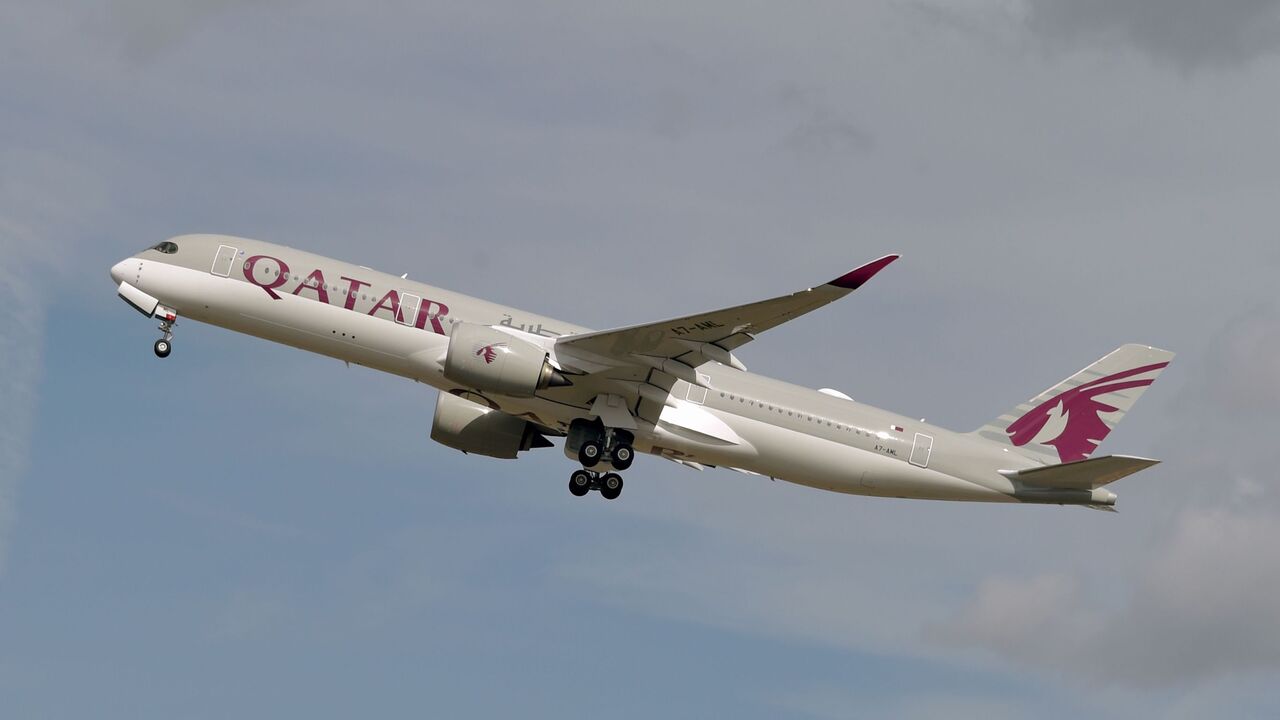 1171588057 This picture taken on September 27, 2019 shows an Airbus A350 of Qatar Airways company after taking off from the Toulouse-Blagnac airport, near Toulouse. (Photo by PASCAL PAVANI / AFP) (Photo by PASCAL PAVANI/AFP via Getty Images)