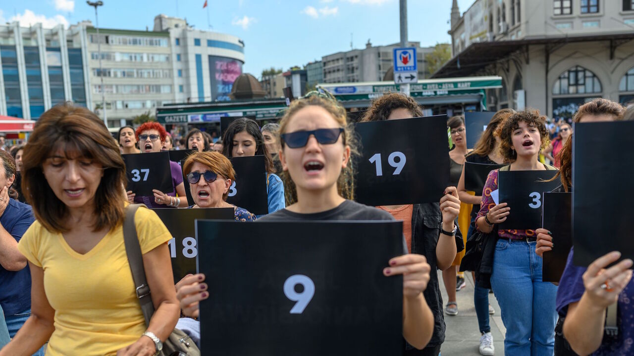 1171630363 Women hold signs with different numbers symbolizing the women murders during a protest against gender violence in Istanbul, at Kadikoy on September 28, 2019. (Photo by BULENT KILIC / AFP) (Photo credit should read BULENT KILIC/AFP via Getty Images)