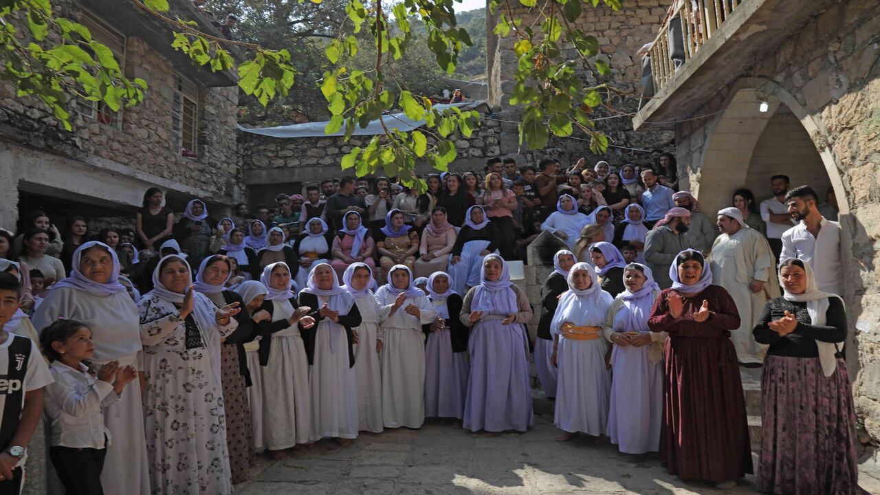 1175085547 Iraqi Yazidis take part in a religious ceremony at the Temple of Lalish, in a valley near the Kurdish city of Dohuk, about 430km northwest of the Iraqi capital Baghdad, on October 10, 2019. - Of the 550,000 Yazidis in Iraq before the Islamic State (IS) group invaded their region in 2014, around 100,000 have emigrated abroad and 360,000 remain internally displaced. (Photo by SAFIN HAMED / AFP) (Photo by SAFIN HAMED/AFP via Getty Images)