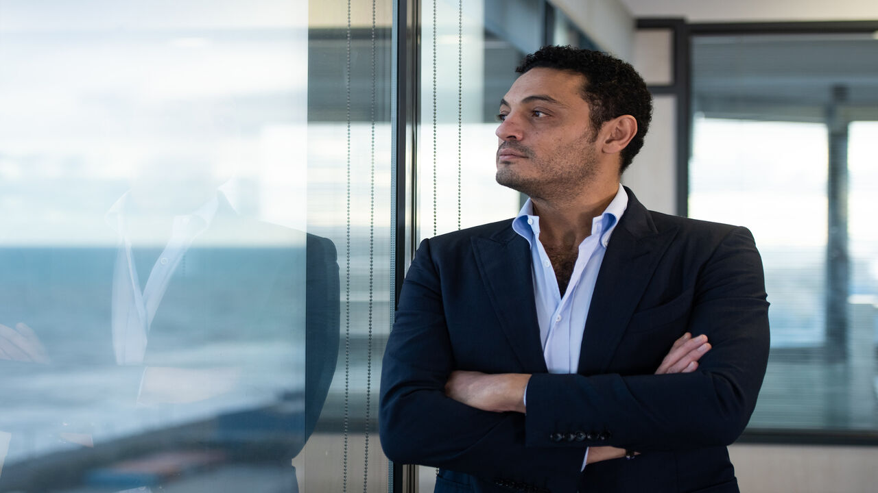 1177864129 Egyptian self-exiled businessman Mohamed Ali poses during an interview in an office near Barcelona on October 23, 2019. - Exiled Egyptian businessman, whose viral videos sparked rare small-scale protests in Egypt in September, says he is working with the opposition to topple President Abdel Fattah al-Sisi and calls for fresh demonstrations in the coming weeks. (Photo by Josep LAGO / AFP) (Photo by JOSEP LAGO/AFP via Getty Images)