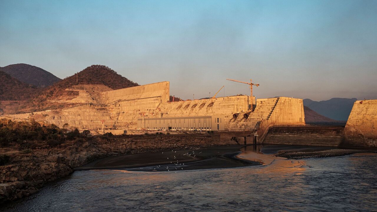 1192325440 A general view of the the Grand Ethiopian Renaissance Dam (GERD), near Guba in Ethiopia, on December 26, 2019. - The Grand Ethiopian Renaissance Dam, a 145-metre-high, 1.8-kilometre-long concrete colossus is set to become the largest hydropower plant in Africa.
Across Ethiopia, poor farmers and rich businessmen alike eagerly await the more than 6,000 megawatts of electricity officials say it will ultimately provide.
Yet as thousands of workers toil day and night to finish the project, Ethiopian negotiators