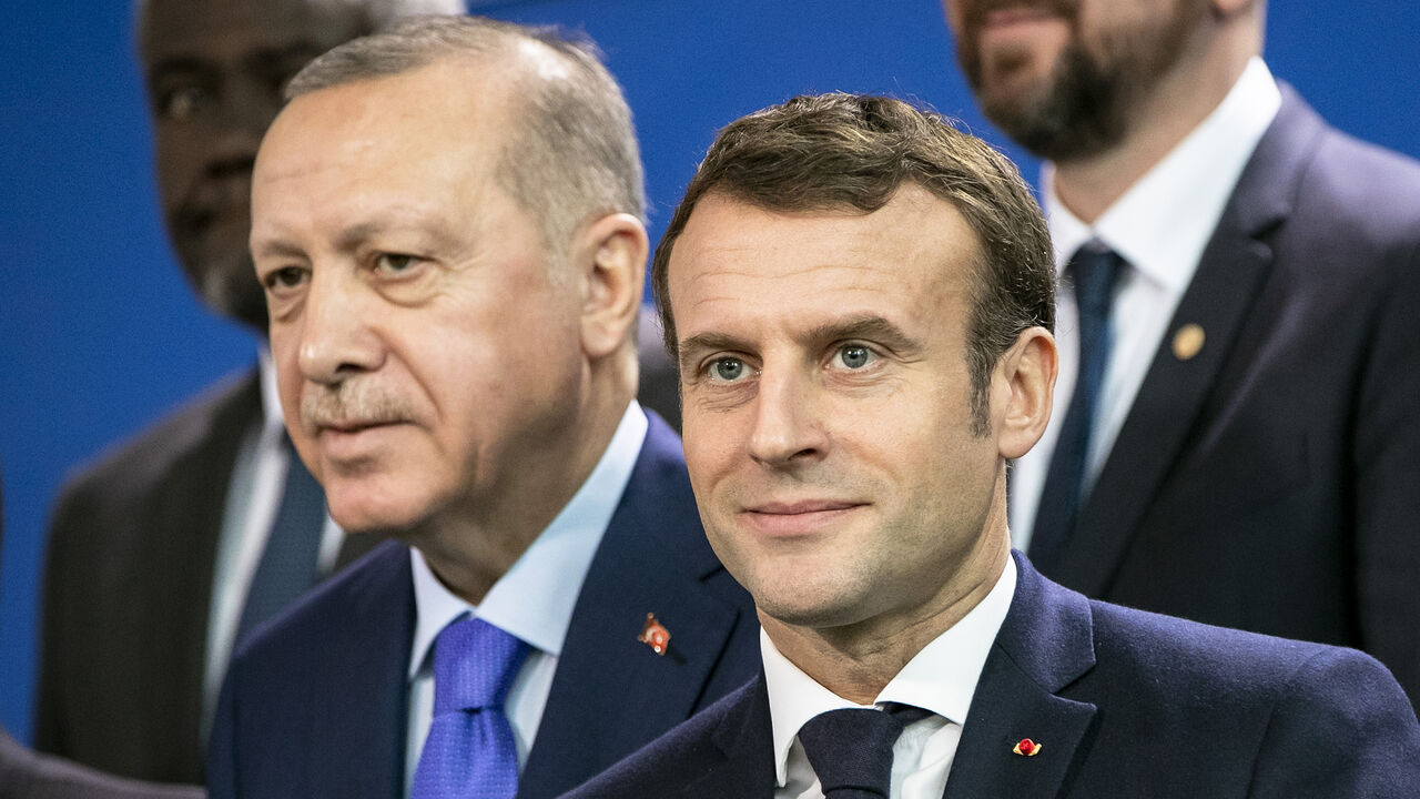 BERLIN, GERMANY - JANUARY 19: French President Emmanuel Macron (R) and Turkish President Recep Tayyip Erdogan (L) are pictured during a family picture at the Chancellery on January 19, 2020 in Berlin, Germany. Leaders of nations and organizations linked to the current conflict are meeting to discuss measures towards reaching a consensus between the warring sides and ending hostilities. (Photo by Emmanuele Contini/Getty Images)