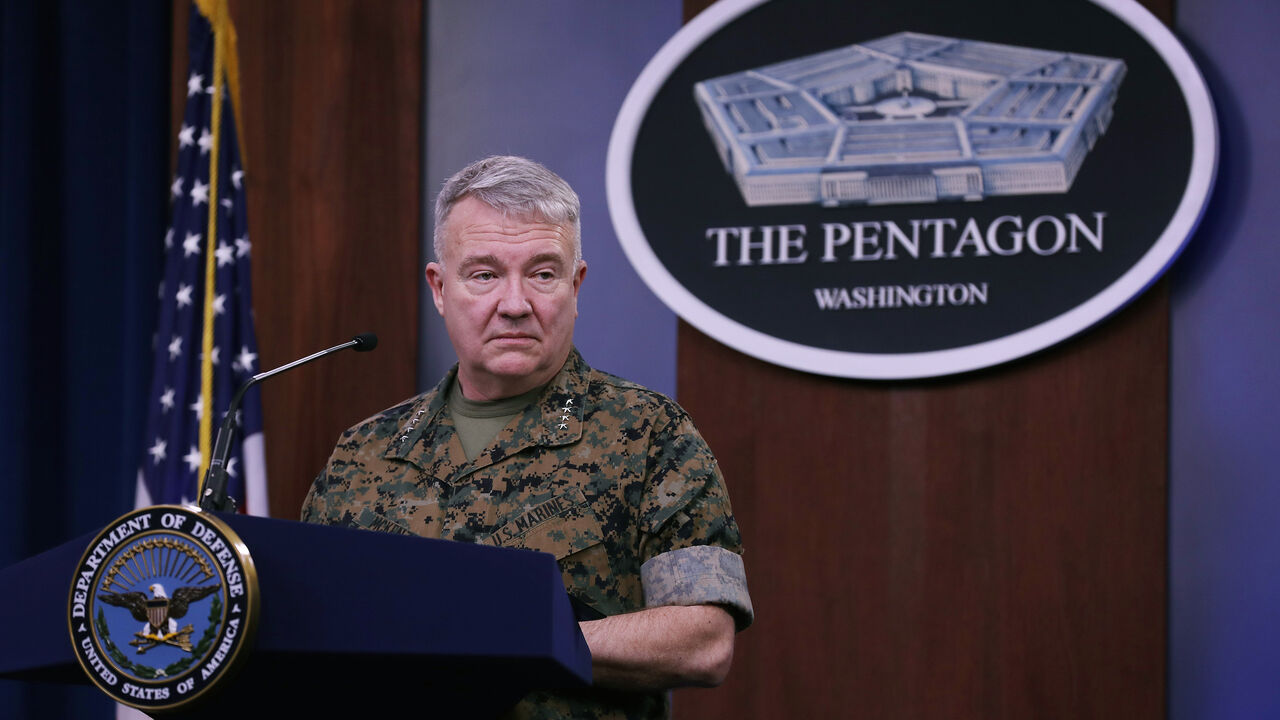 1212178589 ARLINGTON, VIRGINIA - MARCH 13: Marine Corps Gen. Kenneth F. McKenzie, commander of U.S. Central Command, talks to journalists about the military response to rocket attacks that killed two U.S. and one U.K. service members in Iraq during a news briefing at the Pentagon March 13, 2020 in Arlington, Virginia. Because of the threat of transmission of the novel coronavirus (COVID-19), the Pentagon is exercising social distancing by keeping reporters' chairs four feet apart from each other during briefings. (Pho
