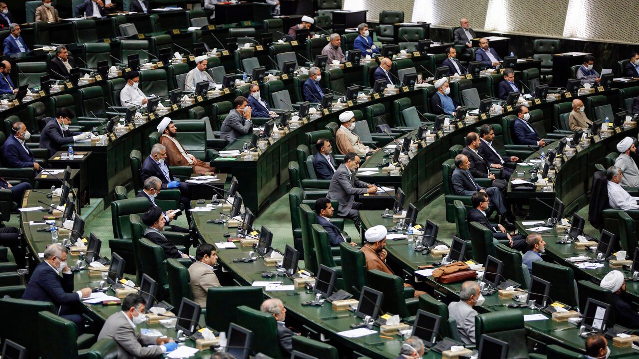 1215825011 Iranian lawmakers attend a session at the Iranian parliament in Tehran on May 28, 2020. - Iran's newly formed parliament elected the former Tehran mayor Mohamad Bagher Ghalibaf as its speaker, consolidating the power of conservatives ahead of next year's presidential election. State television said the 58-year-old received 230 votes out of the 267 cast to secure the post, one of the most influential positions in the Islamic republic. (Photo by STRINGER / AFP) (Photo by STRINGER/AFP via Getty Images)