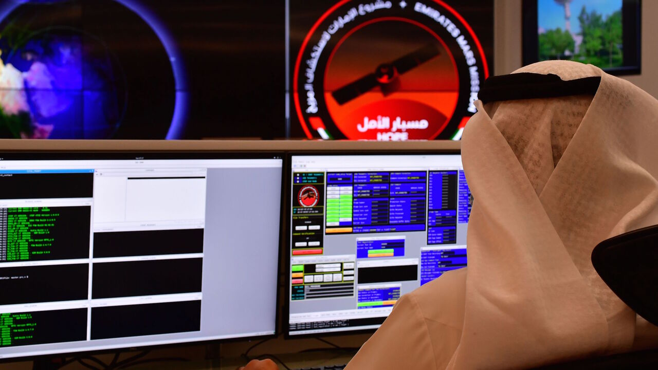 1225990636 An employee works at the control room of the Mars Mission at the Mohammed Bin Rashid Space Centre (MBRSC), in the Gulf emirate of Dubai. - The oil-rich United Arab Emirates has built a nuclear power programme and sent a man to space, and now plans to join another elite club by sending a probe to Mars.
Only the United States, India, the former Soviet Union, and the European Space Agency have successfully sent missions to orbit the Red Planet, while China is preparing to launch its first Mars rover later this