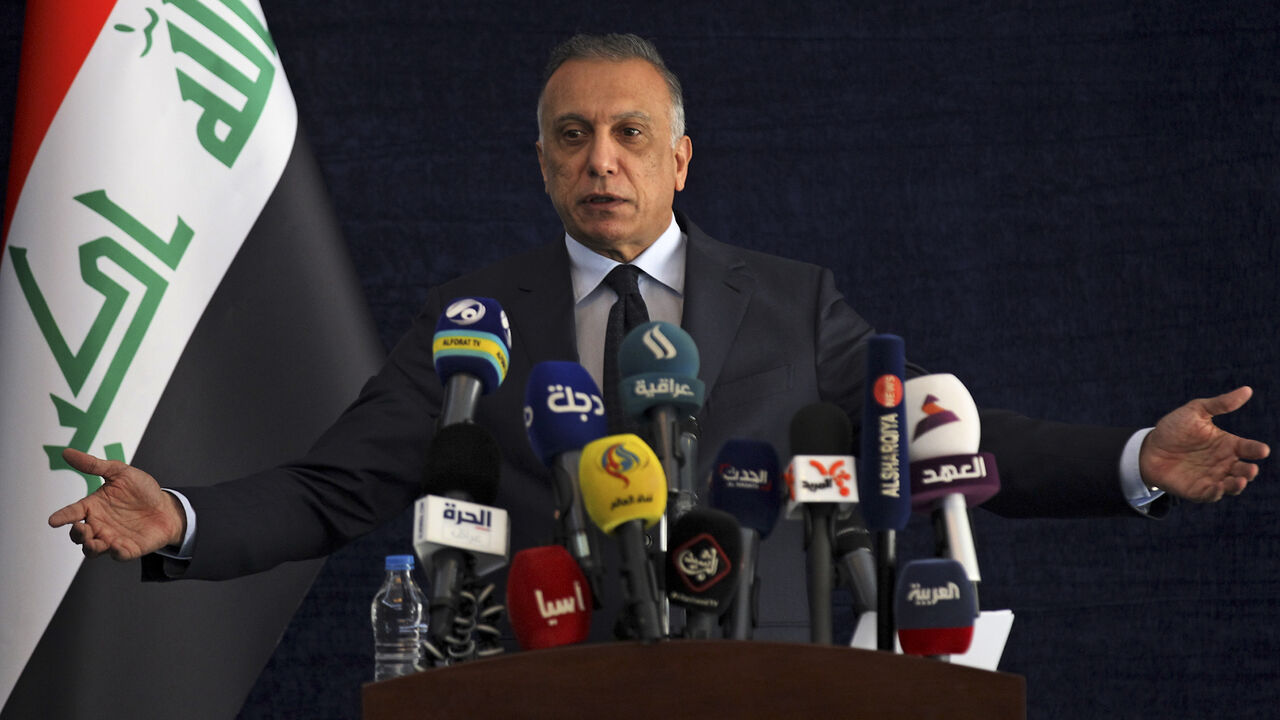 1227257174 Iraqi Prime Minister Mustafa al-Kadhemi speaks during a press conference in Basra on July 15, 2020, during his first visit to the southern Iraqi province. (Photo by AHMAD AL-RUBAYE / POOL / AFP) (Photo by AHMAD AL-RUBAYE/POOL/AFP via Getty Images)