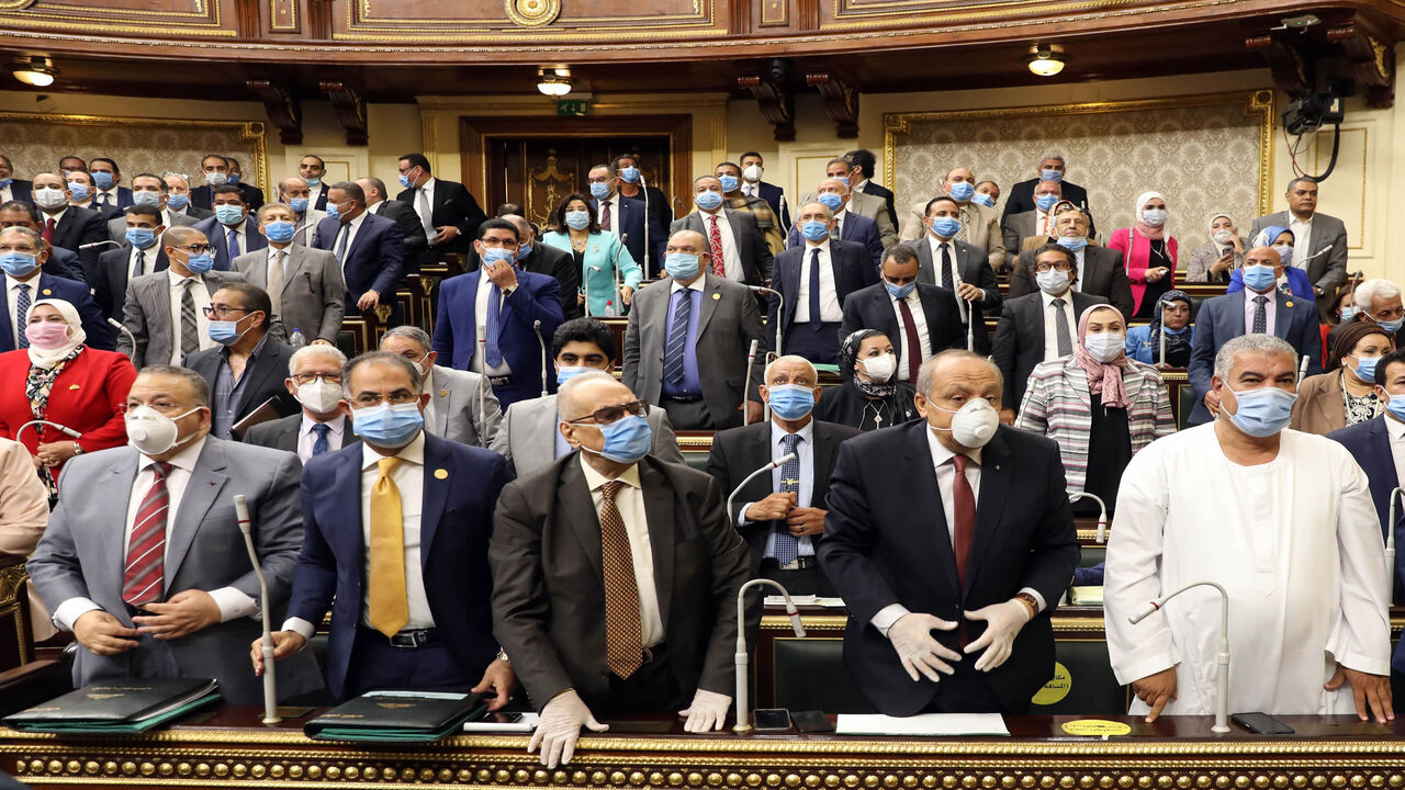1227708066 Egyptian parliament members attend a general session in the capital Cairo on July 20, 2020. - Egypt's parliament greenlighted behind a closed-doors session later today, the possible deployment of troops in Libya to support Cairo's ally Khalifa Haftar, if rival Turkish-backed forces recapture the city of Sirte, the house said. (Photo by - / AFP) (Photo by -/AFP via Getty Images)