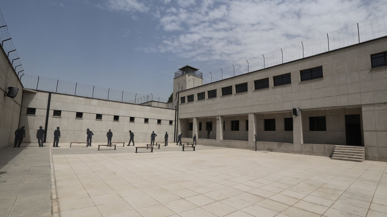 454751784 A picture taken on September 2, 2014 in the Iranian capital Tehran shows bronze statues displayed in the courtyard of the "Qasr prison", a former prison hosting political prisoners that was turned into a museum in 2012. The building was built in 1790 at the time of Qajar king, Fath-ali Shah by the Russian architect Markov before it was converted into a prison in 1929. AFP PHOTO/ATTA KENARE (Photo credit should read ATTA KENARE/AFP via Getty Images)
