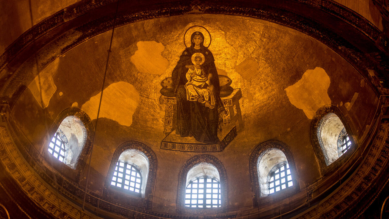 509586924 ISTANBUL, TURKEY - FEBRUARY 11: The ceiling of one of the dome's inside the Hagia Sophia Museum is seen on February 11, 2016 in Istanbul, Turkey. The Hagia Sophia (Ayasofya) Museum is one of the most visited tourist attractions in Turkey, with more than 3 million visitors per year. Constructed in 537 the museum originally served as an Orthodox Cathedral, later a Roman Catholic church and was converted into a mosque when Constantinople was conquered by the Ottoman Turks in 1453. In 1935 it was opened as a mu