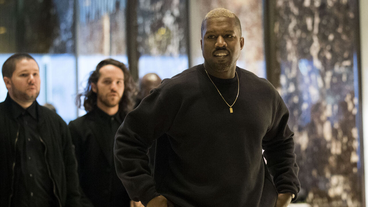 629487682 NEW YORK, NY - DECEMBER 13: Kanye West arrives at Trump Tower, December 13, 2016 in New York City. President-elect Donald Trump and his transition team are in the process of filling cabinet and other high level positions for the new administration. (Photo by Drew Angerer/Getty Images)