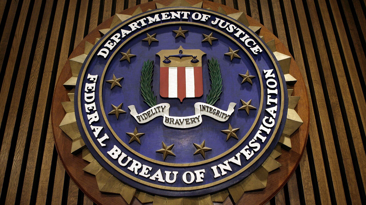 73534290 WASHINGTON - MARCH 09: The seal of the F.B.I. hangs in the Flag Room at the bureau's headquaters March 9, 2007 in Washington, DC. F.B.I. Director Robert Mueller was responding to a report by the Justice Department inspector general that concluded the FBI had committed 22 violations in its collection of information through the use of national security letters. The letters, which the audit numbered at 47,000 in 2005, allow the agency to collect information like telephone, banking and e-mail records without a