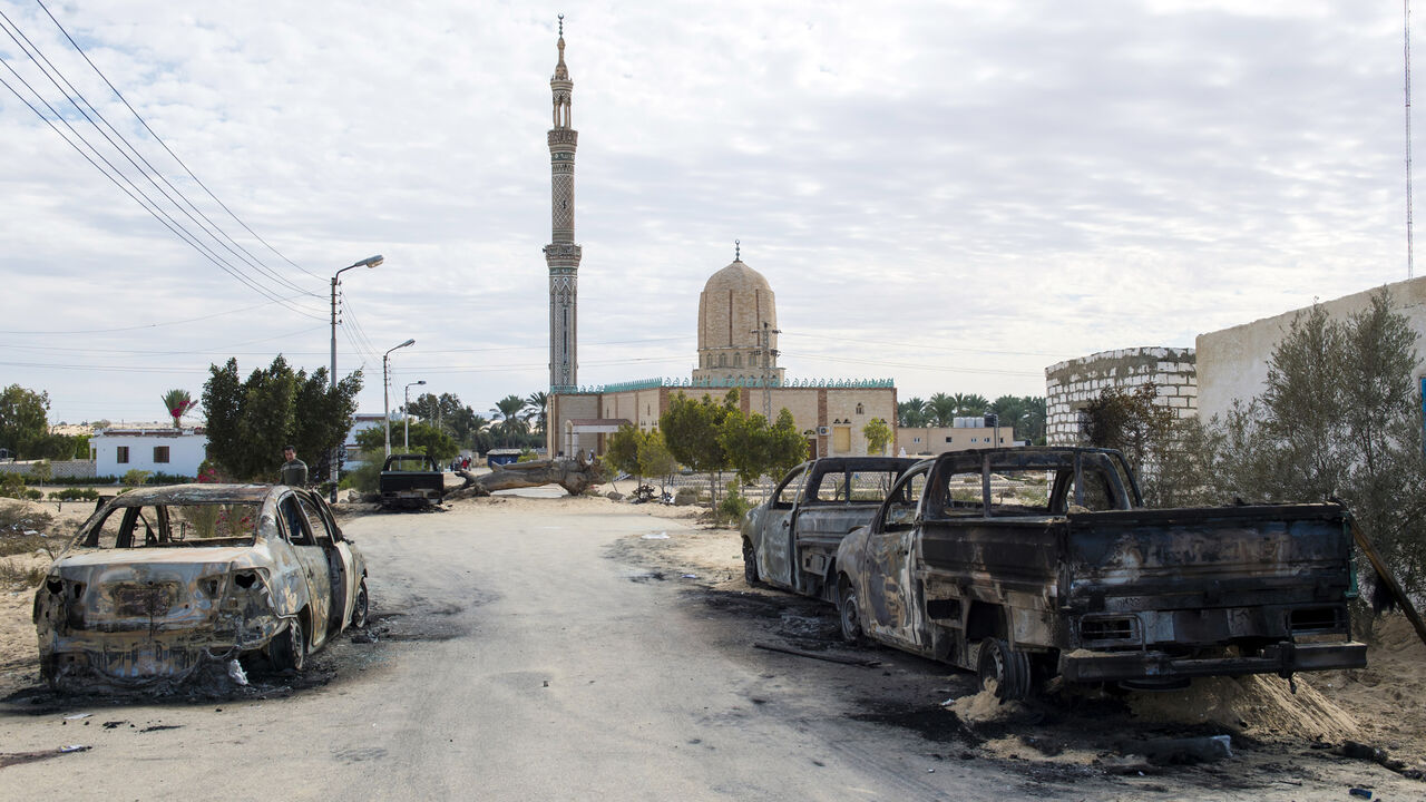 879139750 TOPSHOT - A picture taken on November 25, 2017, shows the Rawda mosque, roughly 40 kilometres west of the North Sinai capital of El-Arish, after a gun and bombing attack.
Armed attackers killed at least 235 worshippers in a bomb and gun assault on the packed mosque in Egypt's restive North Sinai province, in the country's deadliest attack in recent memory. / AFP PHOTO / STR (Photo credit should read STR/AFP via Getty Images)
