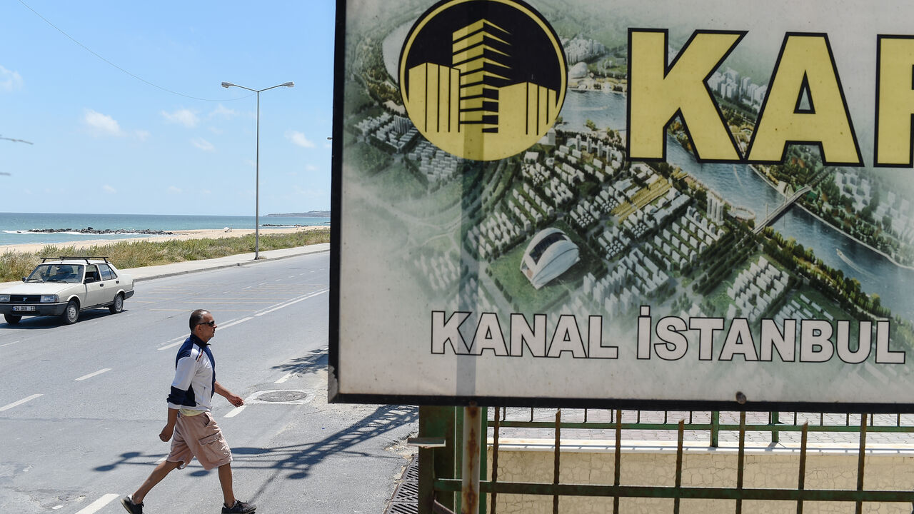 TURKEY-VOTE-ENVIRONMENT-WATER-TRANSPORT A real estate advertising offers apartments with the view on the canal, in the small coastal village of Karaburun, near Istanbul, on June 12, 2018. - Karaburun's residents are waiting if a controversial new canal that will be built for Istanbul will change the region for the good. The ambitious Canal Istanbul project, first announced by Turkish current President in 2011 when he was prime minister, would begin in the Istanbul district of Kucukcekmece and then head toward Sazlidere reservoir before emerging i