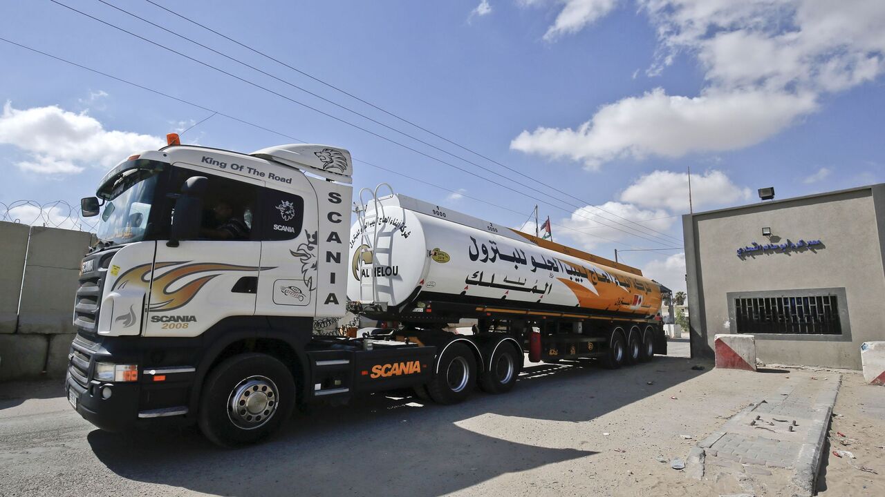 1016965308 Fuel tankers arrive at Kerem Shalom crossing in the southern Gaza Strip on August 15, 2018. - Israel reopened its only goods crossing with the Gaza Strip on Wednesday in response to relative calm on the border after months of tensions prompted a blockade on most goods from July 9. (Photo by SAID KHATIB / AFP) (Photo credit should read SAID KHATIB/AFP via Getty Images)