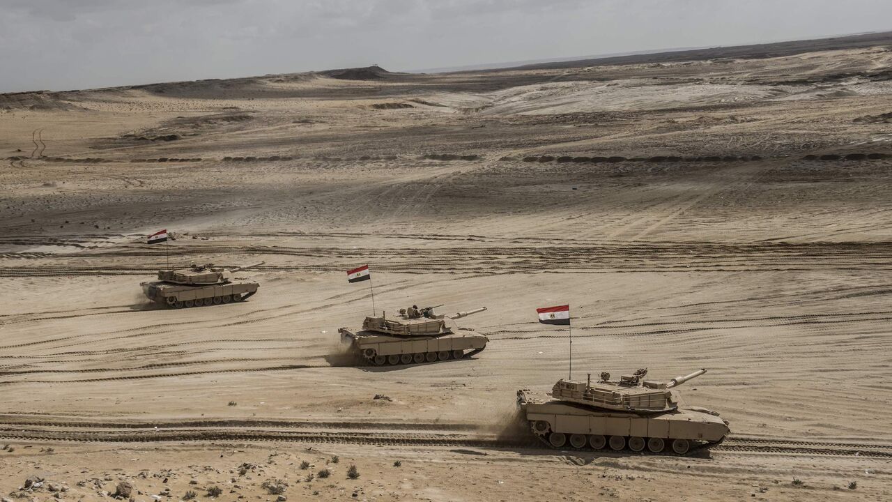 1061853628 TOPSHOT - Egyptian tanks take part in the Arab Shield joint military exercises at Mohamed Naguib military base in El-Hamam near the Mediterranean coast, about 240 kilometres northwest of the capital Cairo on November 15, 2018. - Forces from Saudi Arabia, Egypt, the UAE, Kuwait, Bahrain and Jordan are taking part in the maneuvers. (Photo by Khaled DESOUKI / AFP) (Photo credit should read KHALED DESOUKI/AFP via Getty Images)