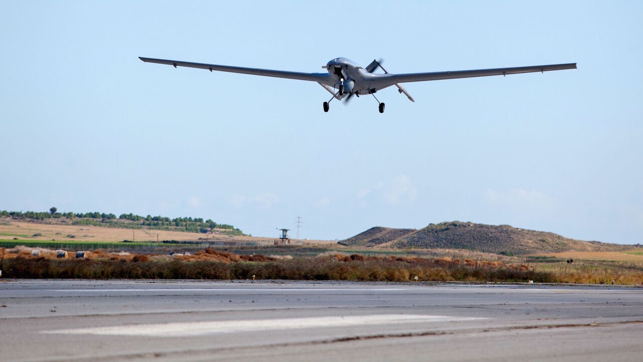 1189007249 The Bayraktar TB2 drone is pictured flying on December 16, 2019 at Gecitkale Airport in Famagusta in the self-proclaimed Turkish Republic of Northern Cyprus (TRNC). - The Turkish military drone was delivered to northern Cyprus today amid growing tensions over Turkey's deal with Libya that extended its claims to the gas-rich eastern Mediterranean. The Bayraktar TB2 drone landed in Gecitkale Airport in Famagusta around 0700 GMT, an AFP correspondent said, after the breakaway northern Cyprus government approve