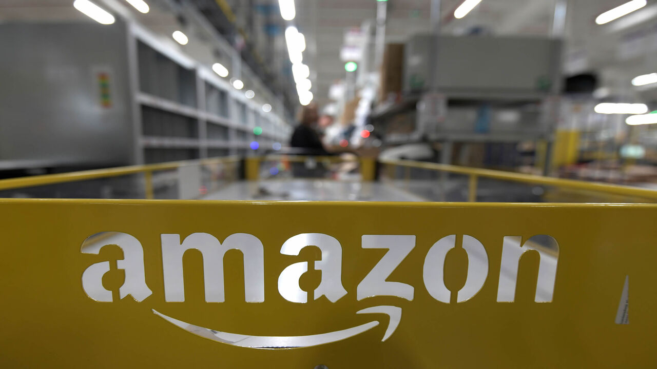 1189253717 This picture shows the logo of US online retail giant Amazon at the distribution center in Moenchengladbach, western Germany, on December 17, 2019. (Photo by INA FASSBENDER / AFP) (Photo by INA FASSBENDER/AFP via Getty Images)