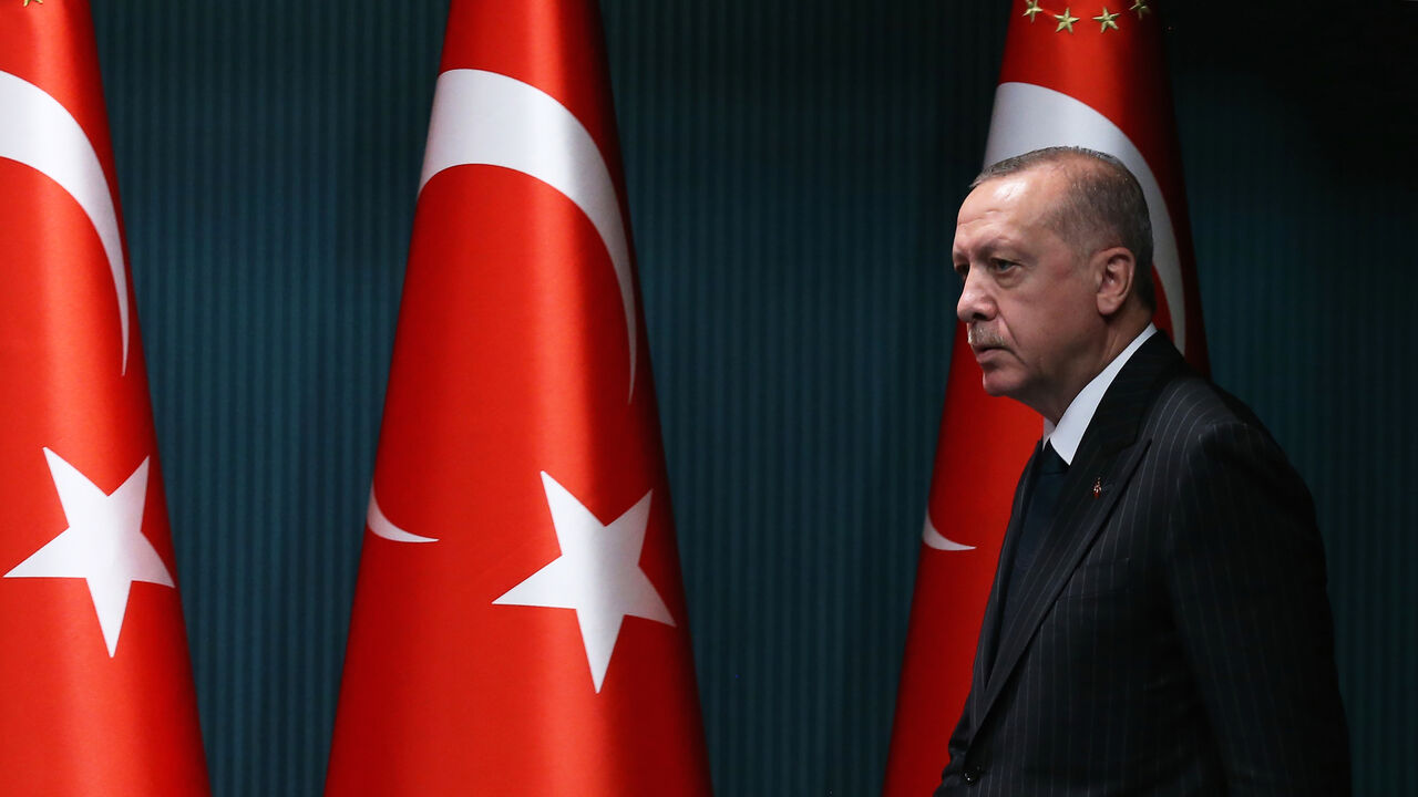 1228186081 Turkish President Recep Tayyip Erdogan arrives for a press conference following the weekly cabinet meeting at the Presidential Complex in Ankara on August 24, 2020. (Photo by Adem ALTAN / AFP) (Photo by ADEM ALTAN/AFP via Getty Images)
