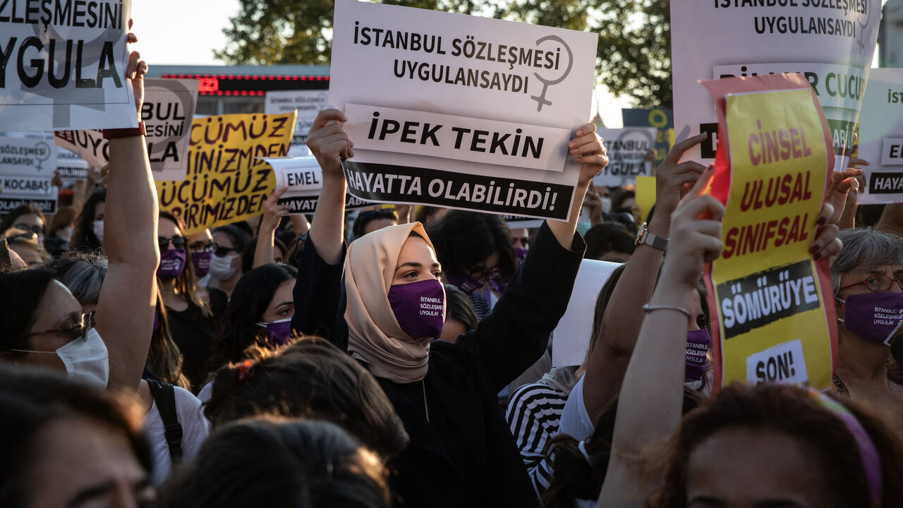 1264148552 ISTANBUL, TURKEY - AUGUST 05: Women chant slogans and wave signs during a demonstration for the prevention of violence against women on August 05, 2020 in Istanbul, Turkey. Women's rights groups staged simultaneous protests in various Turkish cities in support of the Istanbul Convention on domestic violence against women. The Istanbul Convention is an international agreement for the prevention of violence against women. Forty six countries signed the agreement started by the European Council in 2011. Turk