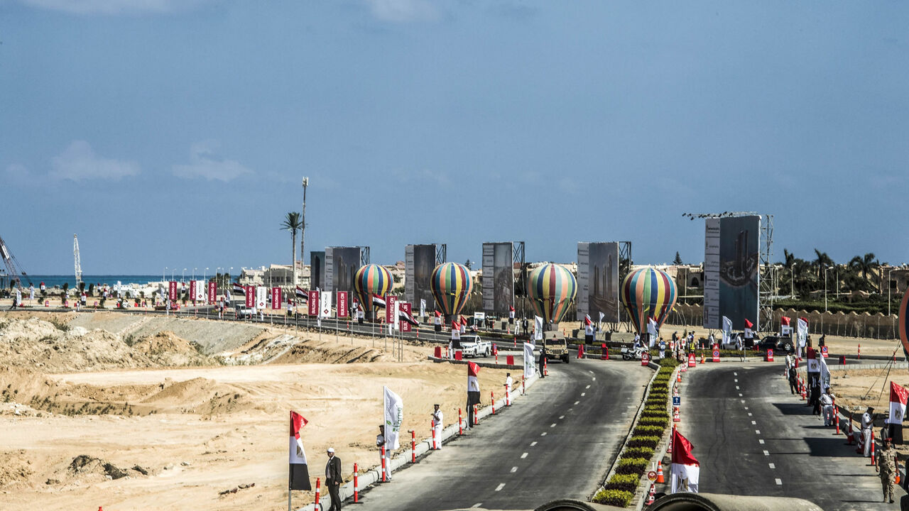 864381586 A picture taken on October 21, 2017, shows the highway passing through the New Alamein City, situated about 100 kilometres (62 miles) west of the northern city of Alexandria. / AFP PHOTO / KHALED DESOUKI (Photo credit should read KHALED DESOUKI/AFP via Getty Images)